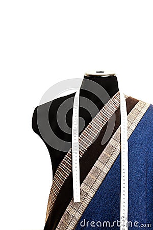 Thread fabric wool sewing man cage blue choice design atelier tailor many different things color tape-measure layman-figure dummy Stock Photo