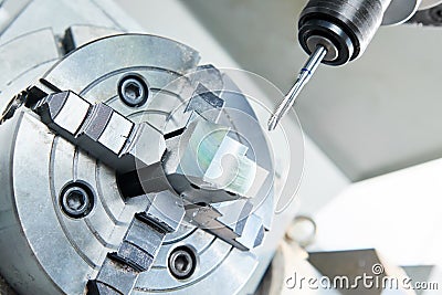Thread or cutting process on cnc machine by tap Stock Photo