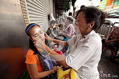 Threading (hair removal) in Chinatown Bangkok. Editorial Stock Photo