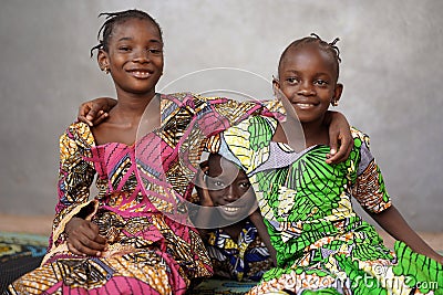 Three African black Children Smiling and Laughing together Stock Photo