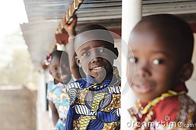 Three African Children Smiling and Laughing outdoors Stock Photo