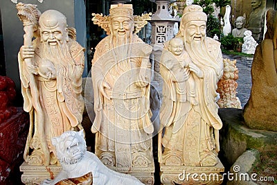 Three asian wise men marble sculptures Stock Photo