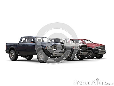 Three awesome metallic pick-up trucks - showroom shot Stock Photo