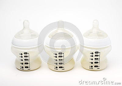 Three baby bottles Stock Photo