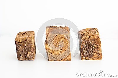 Three bars of artisanal hand crafted soap made from leftover bones sinew and caustic soda isolated on white Stock Photo