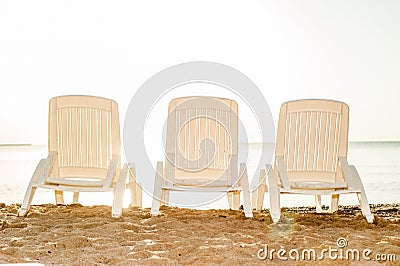 Three beach chair on sand beach Stock Photo