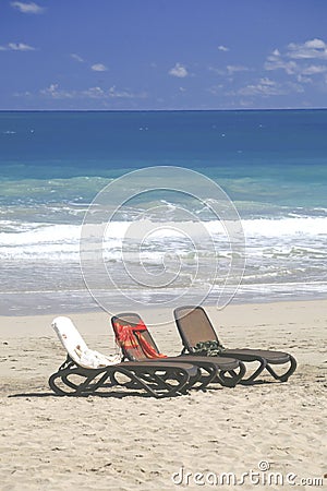 Three beach lounges, Cabarete, Dominican Republic Stock Photo