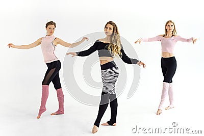 Girls train yoga pilates, engage in dances Stock Photo