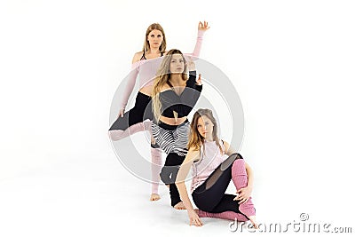 Girls train yoga pilates, engage in dances Stock Photo