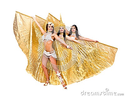 Three belly dancers with golden wings Stock Photo