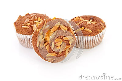 Three biscuit cupcakes with nuts Stock Photo