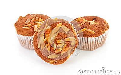 Three biscuit cupcakes with nuts Stock Photo