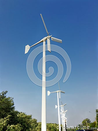 Three Blades Wind Turbines Stock Photo