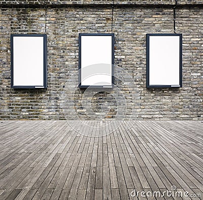 Three blank advertising light box on the wall Stock Photo