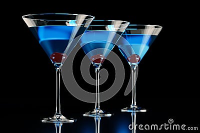 Three blue cocktails with cherry on black Stock Photo