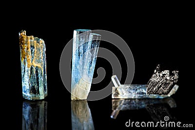 Three blue Tourmaline, Indicolite, black background, healing stone, mineral Stock Photo