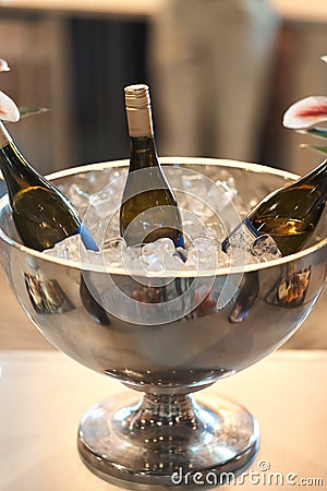 Three bottles of champagne in more often with ice Stock Photo