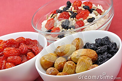 Three Bowls with Rice and Dried Fruit Stock Photo