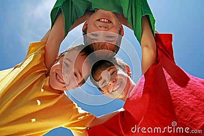 Three Boys Huddling Stock Photo