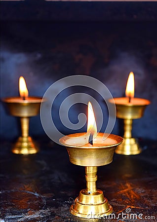 Three Brass Lamps - Diwali Festival in India - Spirituality, Religion and Worship Stock Photo