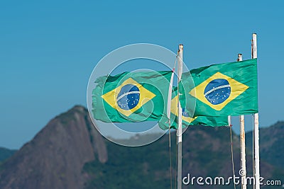 Three Brazilian Flags in the Wind Stock Photo