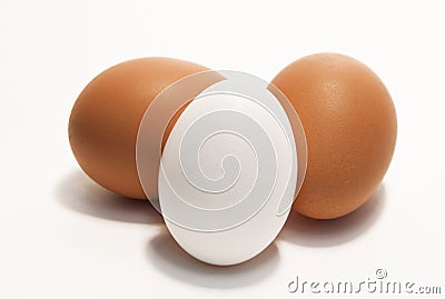 Three Brown And White Eggs Stock Photo