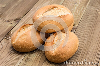 Three Buns on wood Stock Photo