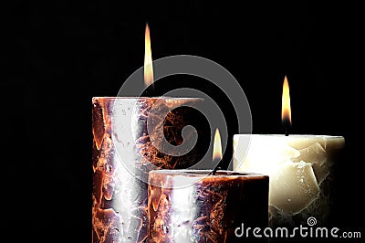 Three burning candles Stock Photo