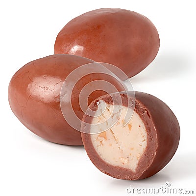 Three caramel filled chocolate eggs Stock Photo