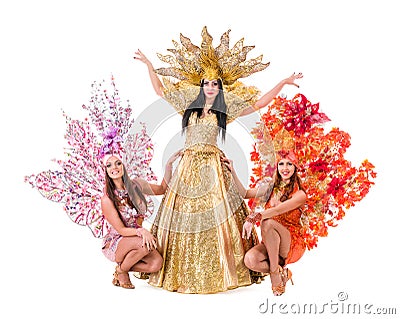 Three carnival dancer women dancing against Stock Photo