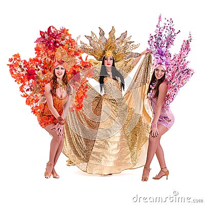 Three carnival dancer women dancing against Stock Photo