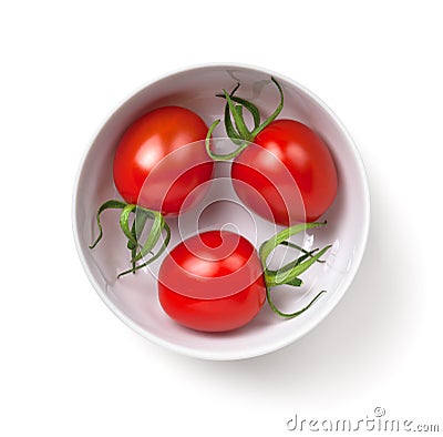 Three Cherry Tomatoes In White Bowl Isolated Stock Photo