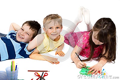 Three Children Happily Drawing Stock Photo