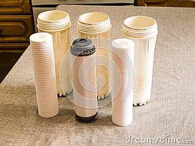 Three clean water filters. Replacing multi-stage water filter cartridges Stock Photo