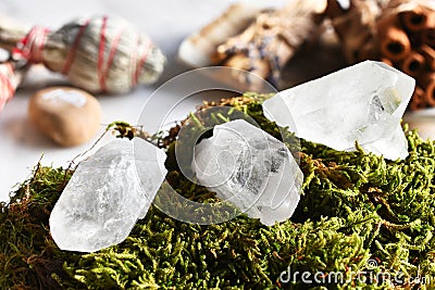 Three Clear Quartz Crystal on Green Moss Stock Photo