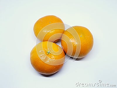 Three clementines on a white isolated background Stock Photo