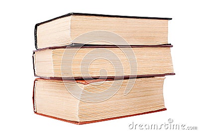 Three closed old thick paper books with yellow pages white background isolated closeup, book heap, pile, stack, hardcover textbook Stock Photo