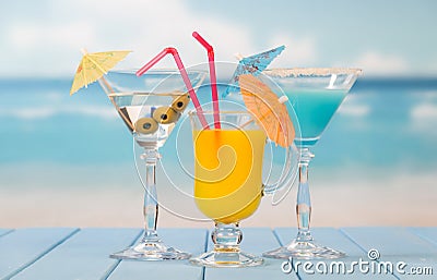 Three cocktails with umbrellas Stock Photo