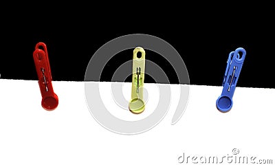 Three colored clothespin Stock Photo