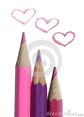 Three colored pencils and three painted hearts on white background Stock Photo