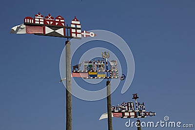 Three colorful wooden weathercocks Stock Photo