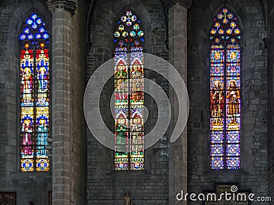 Three colourful stained-glass windows in church Editorial Stock Photo