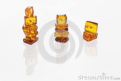 three columns of yellow amber Stock Photo