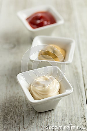 Three Condiment Bowls Stock Photo