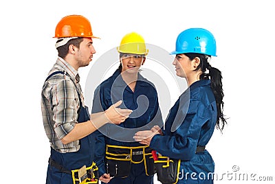 Three constructor workers having conversation Stock Photo