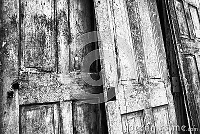 Three Cracked and Weathered Doors Stock Photo