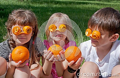 Three crazy little orange lovers Stock Photo