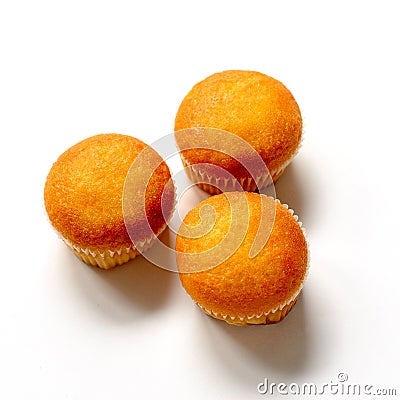 Three cupcakes with different fillings, top view, on a white background Stock Photo
