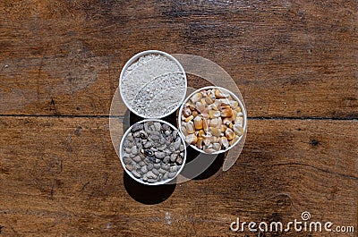 Three cups of grain well composed on the under the sunlight Stock Photo