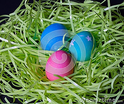 Three Easter Eggs on Grass Stock Photo